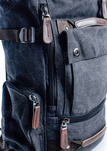 Canvas blue Backpack isolated on white. Hipster's backpack bag