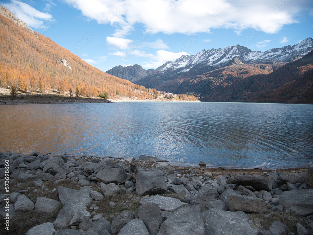 The dry bottom of the Ceresole Reale lake in autumn. Alps, Italy.