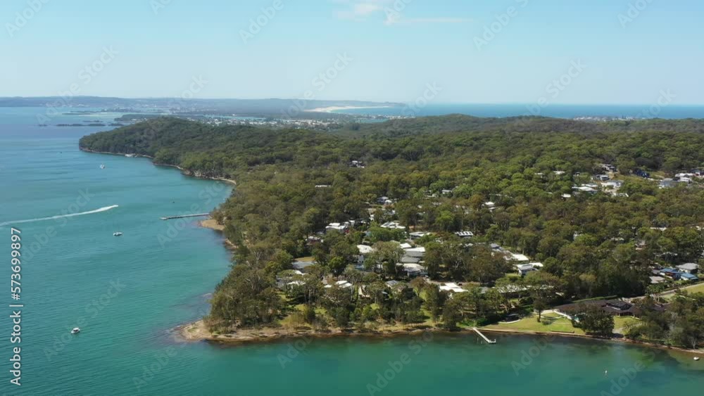 Scenic lakeshore waterfront of Murrays beach on Lake Macquarie in Au as 4k.
Scenic lakeshore waterfront of Murrays beach on Lake Macquarie in Au as 4k.