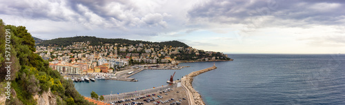 Marina and Residential Homes in Historic City of Nice, France. View from Castle Hill. Cloudy Evening before Sunset. Panorama