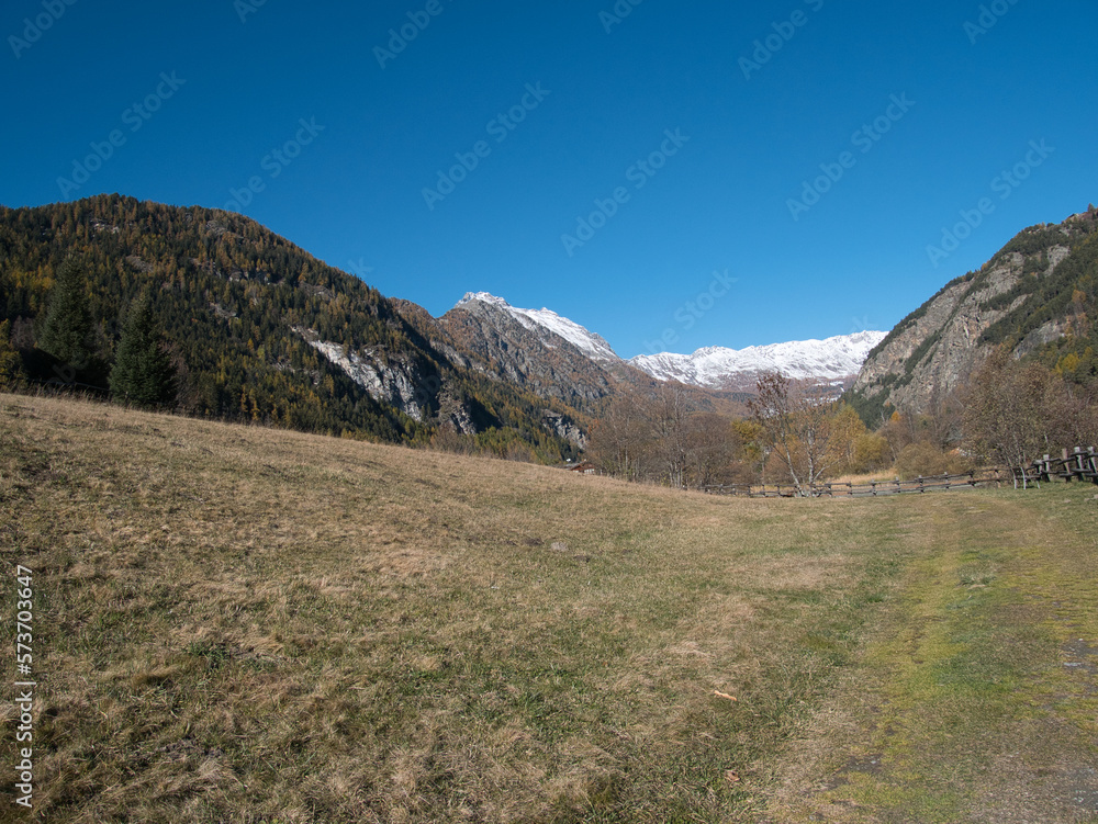 Around Brusson lake in autumn. Ayas valley, Italy. Around Brusson lake in autumn. Ayas valley, Italy.