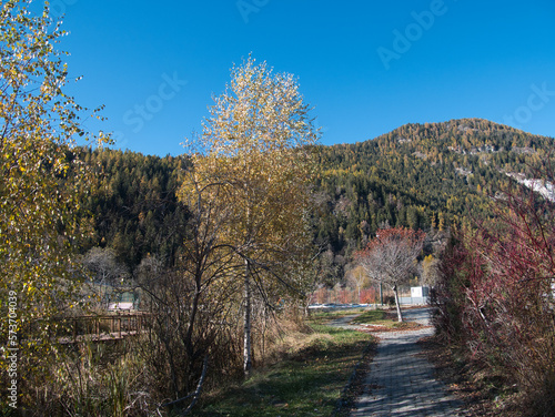 Around Brusson lake in autumn. Ayas valley, Italy.