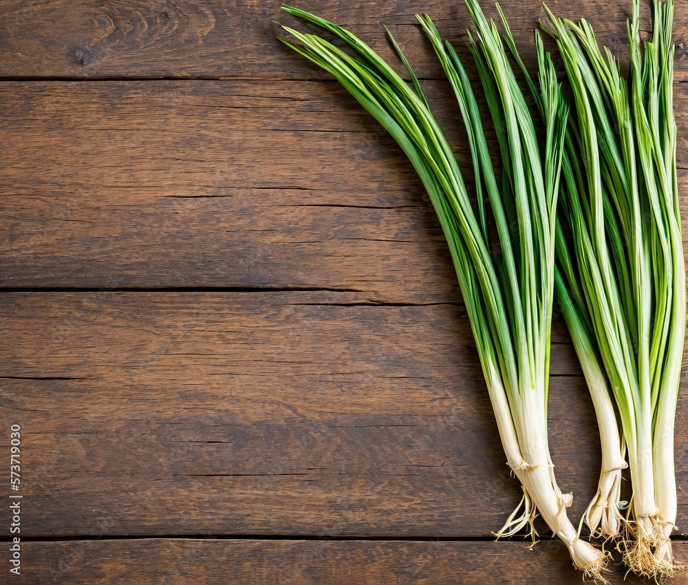fresh green onion on wooden background fresh green onion on wooden background