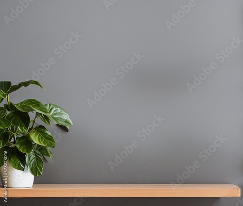 green plant in pot on wooden table