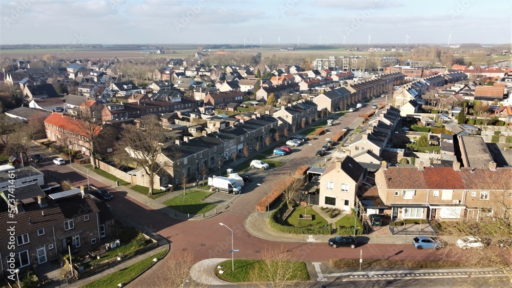 Klundert is a village in North Brabant near industrial estate Moerdijk. Dutch countryside with traditional housing and houses where families live.