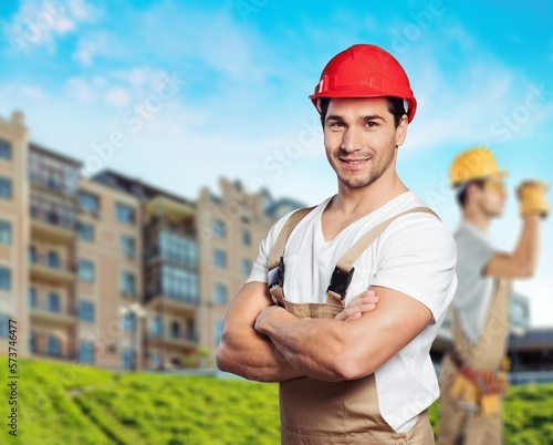 Confident foreman worker in safety helmet