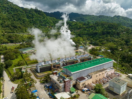Geothermal power plant in a mountainous province. Renewable energy production at a power station. Negros, Philippines.