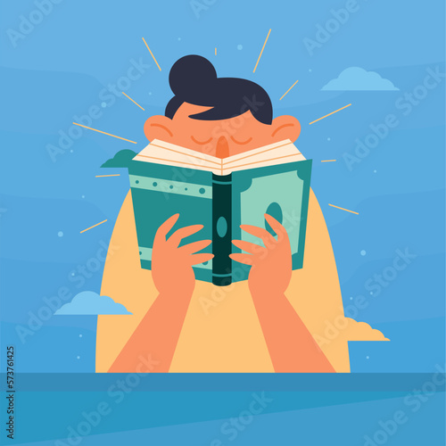 man reading text book