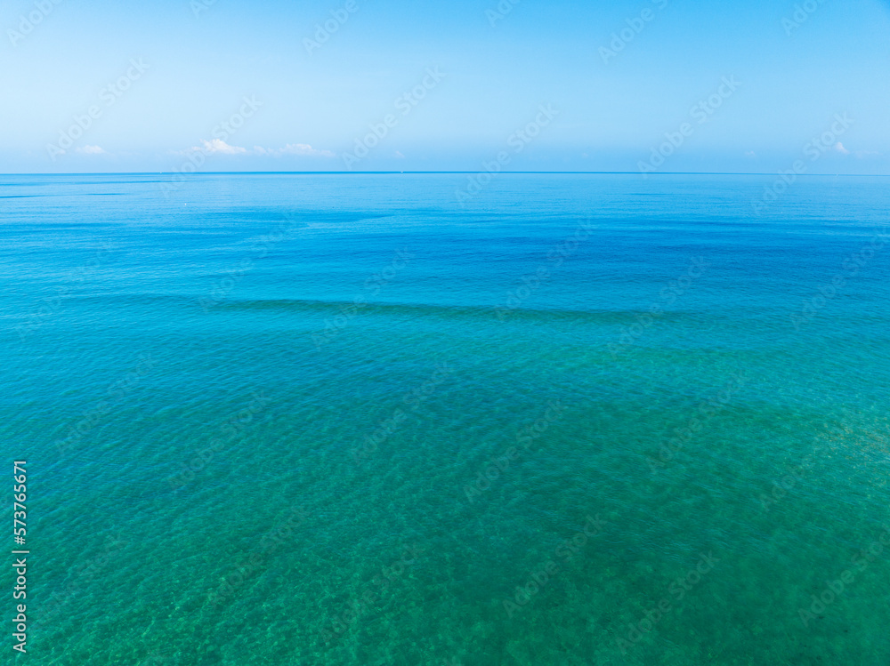 Beautiful sea water surface Blue sky background. Bird's eye view sea landscape nature background