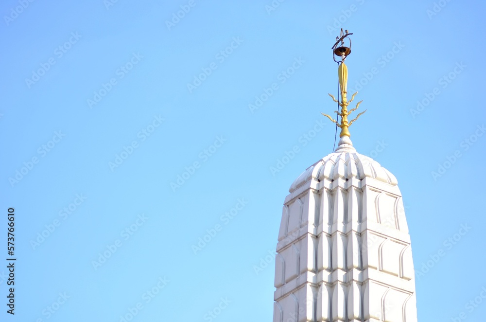 The top of pagoda with blue sky in Bangkok.