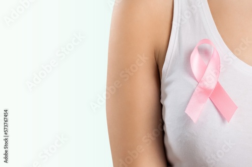 Happy woman and pink ribbon,breast cancer concept