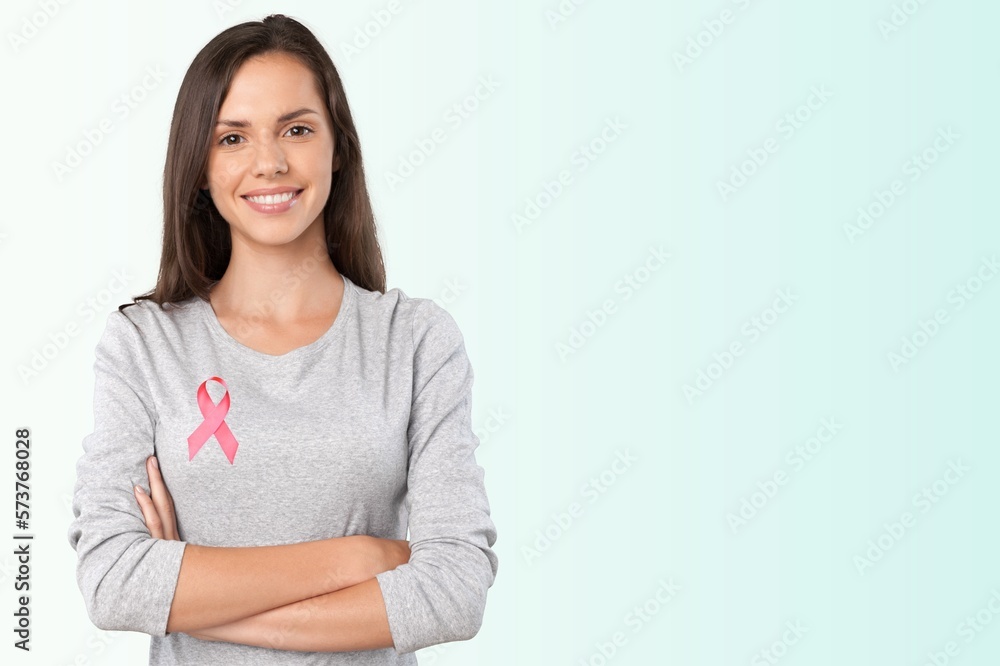 Happy woman and pink ribbon,breast cancer concept Happy woman and pink ribbon,breast cancer concept