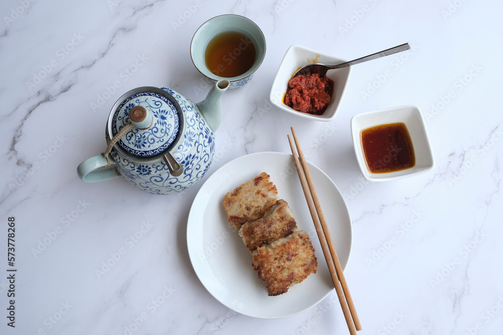 Cantonese favourite dish during Chinese New Year. Turnip Cake aka Lo Bak Go. Made from sliced or