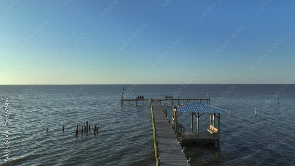 Enjoying the sunset on a dock near The American Legion