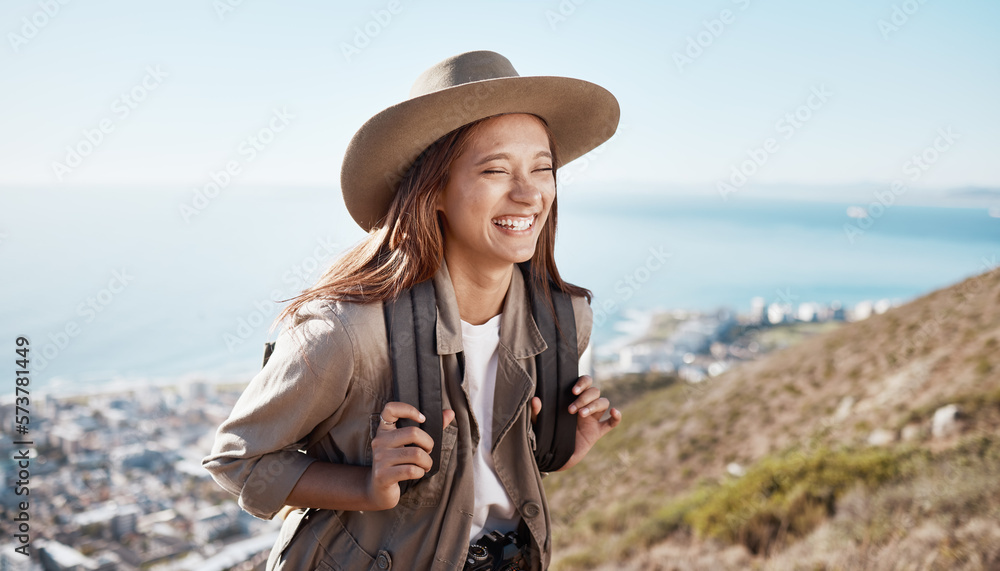 Happy, hiking and woman laughing with travel, outdoor in nature with freedom and fitness, funny and active lifestyle. Female hiker on mountain, joke and person with adventure, happiness and care free