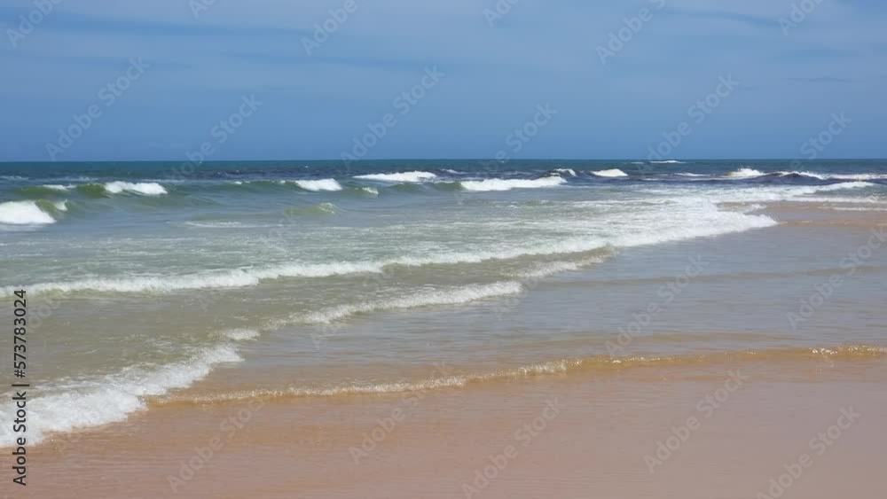 Beautiful sunny day at a Brazilian beach, the Nativos beach of Trancoso, Porto Seguro district - Bahia. Tourist destination of the brazilian northeast.