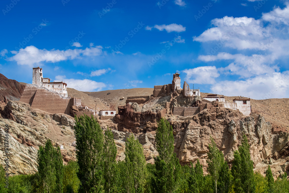 Basgo or Bazgoo, a village situated on the bank of the Indus river in Leh district, Ladakh, India. Ancient cultural and political centre, Basgo Monastery and Himalayan mountains. Blue sky bakcground.