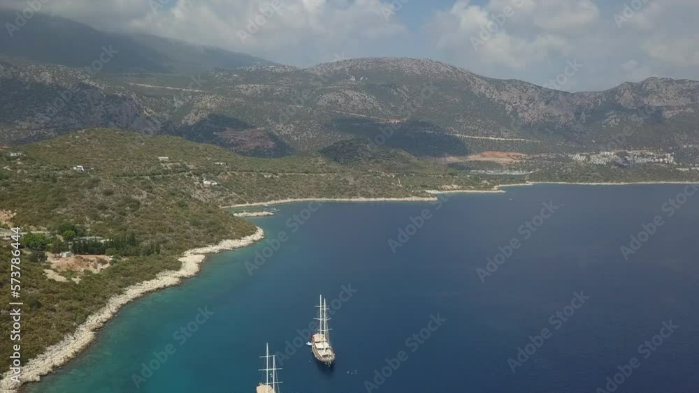 Hazy Turkish Mediterranean sea coast with tall tour ships anchored Hazy Turkish Mediterranean sea coast with tall tour ships anchored