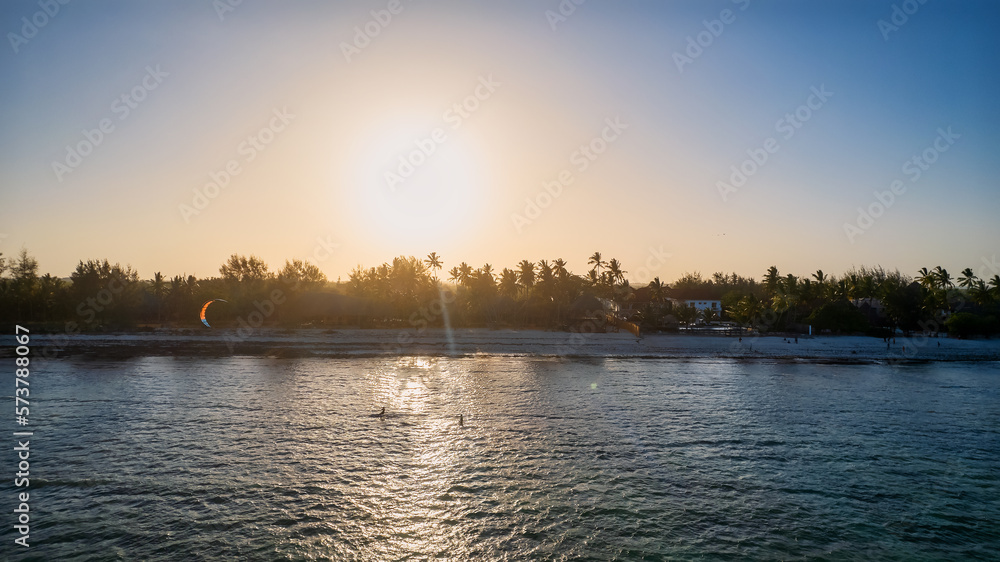 Naklejka premium Kiteboarding and Paradise Beaches: The Ultimate Zanzibar Adventure