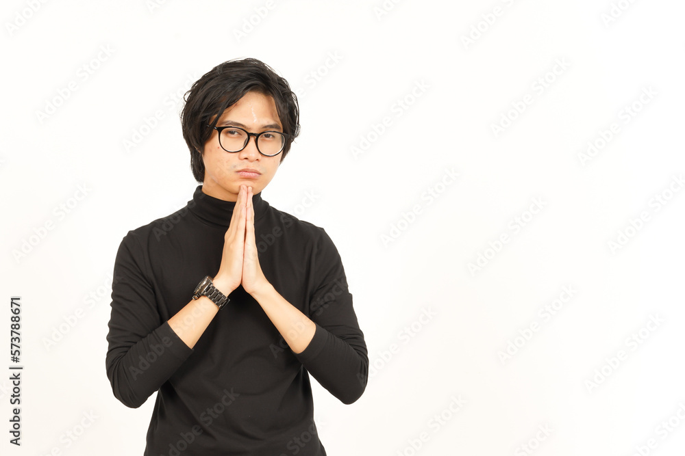 Begging to say sorry Of Handsome Asian Man Isolated On White Background Begging to say sorry Of Handsome Asian Man Isolated On White Background