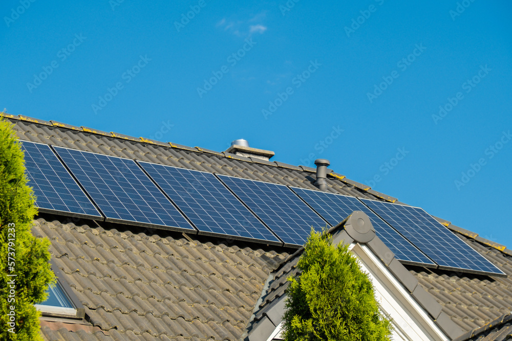 New ecologic house with solar panels Alternative to conventional energy. The battery is charged from a solar cell Advertisement Green energy Sustainable life Renewable New ecologic house with solar panels Alternative to conventional energy. The battery is charged from a solar cell Advertisement Green energy Sustainable life Renewable