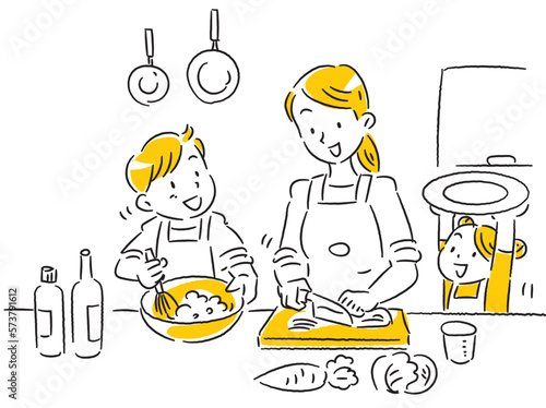 2人のこどもと一緒にキッチンに立つ若いお母さん