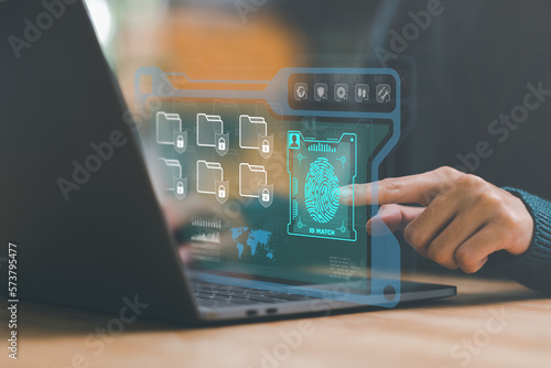 Accountants scan their fingers through the security system, to access documents online, cyber security ,Protecting data from theft ,digital security unlocking or encryption ,internet security