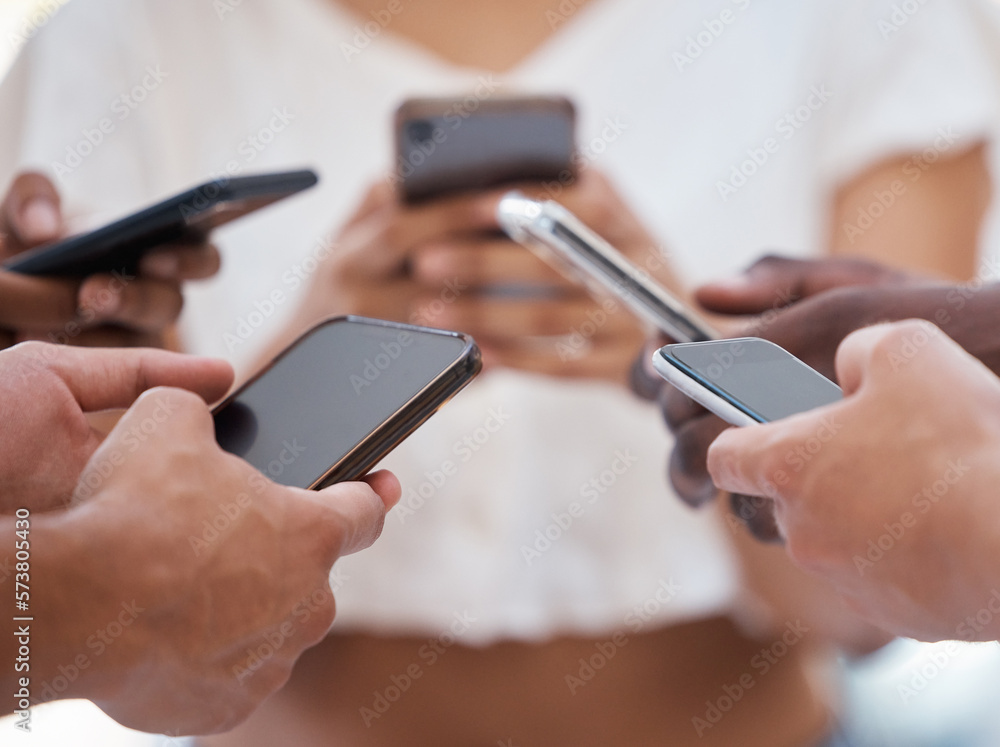Hands, phone and people networking on social media, mobile app or chatting on mockup screen. Hand of group holding smartphone in circle for online network share, data sync or communication on display Hands, phone and people networking on social media, mobile app or chatting on mockup screen. Hand of group holding smartphone in circle for online network share, data sync or communication on display