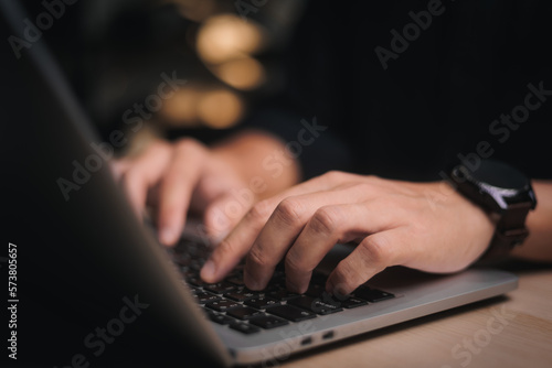 Working on laptop computer