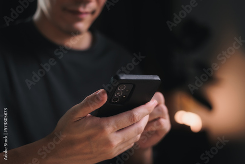 man hand holding smart phone