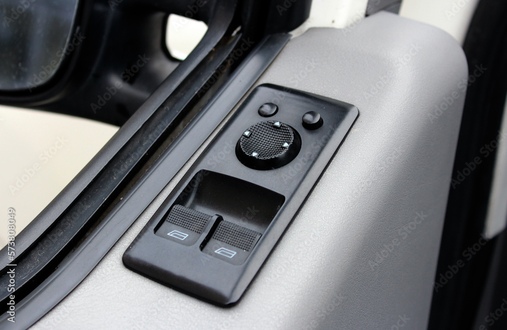 Electric windows control buttons. Window switches in cars. Mirror adjustment. Electric windows control buttons. Window switches in cars. Mirror adjustment.