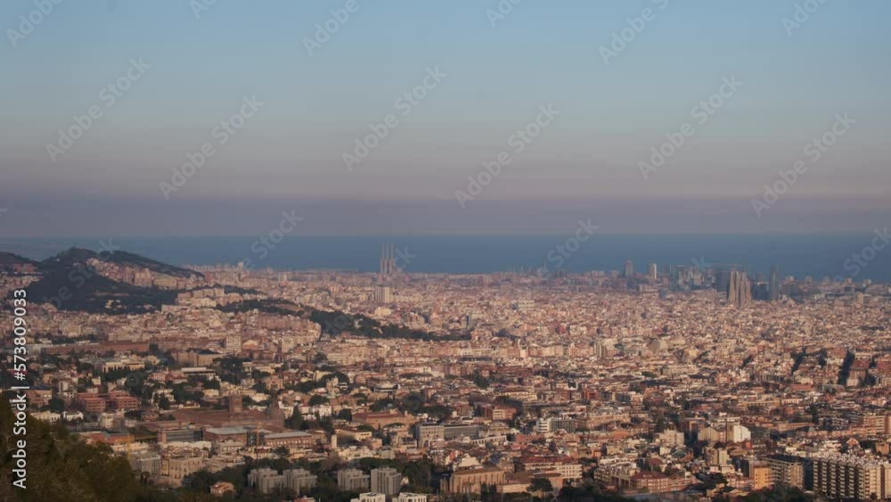 Enjoy a breathtaking panoramic view of the city of Barcelona that will leave you speechless. Observe the majesty of its iconic buildings, its blue sky, and the Mediterranean Sea, all in one image. Enjoy a breathtaking panoramic view of the city of Barcelona that will leave you speechless. Observe the majesty of its iconic buildings, its blue sky, and the Mediterranean Sea, all in one image.