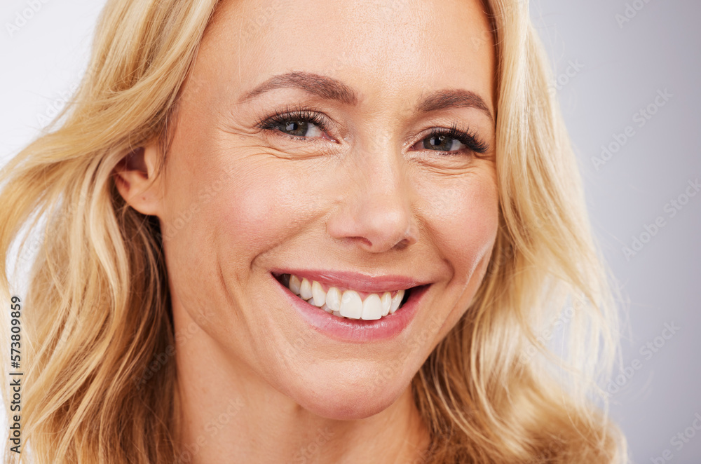 Portrait, skincare and happy with a woman in studio on a gray background for beauty or antiaging treatment. Face, smile and cosmetics with an attractive female in the bathroom for natural skin Portrait, skincare and happy with a woman in studio on a gray background for beauty or antiaging treatment. Face, smile and cosmetics with an attractive female in the bathroom for natural skin