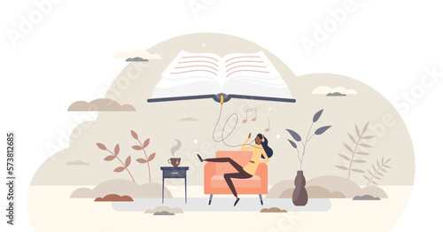 Audiobooks as online library and virtual e-book service tiny person concept, transparent background. Listen downloaded literature in application with headphones illustration.