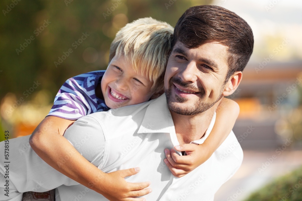 Young happy father having fun with child Young happy father having fun with child