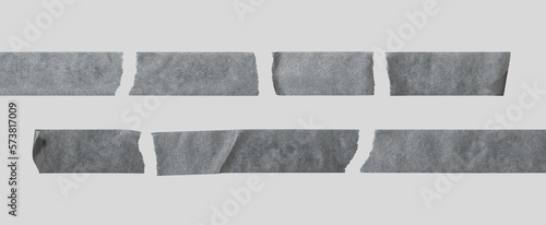 Mockup of black torn adhesive tapes on a gray background.