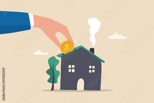 Down payment for house purchasing, mortgage or real estate loan, savings to buy new home or property investment, rental concept, businessman hand home owner putting money dollar coin into new house.