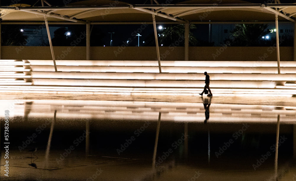 people silhouettes in fluorescent city lights people silhouettes in fluorescent city lights