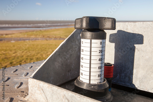 Methane, extracted from an old landfill site on Walney Island, to power a biogas generator producing green electricity, Cumbria, UK photo