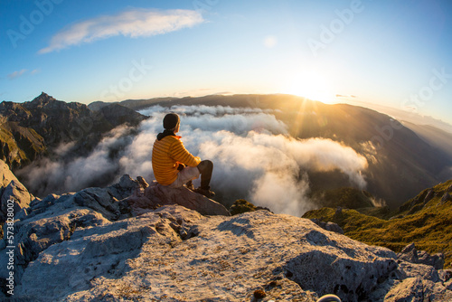 Person Exploring Kahurangi National Park From Sunrise Peak In New Zealand photo