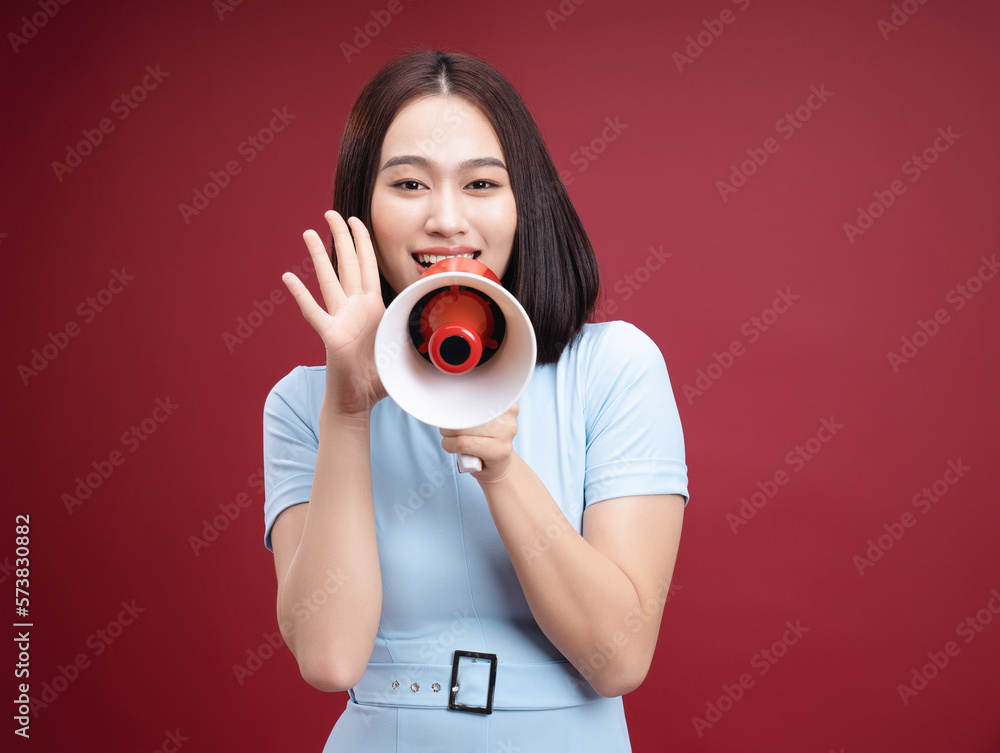 Young Asian woman on background Young Asian woman on background