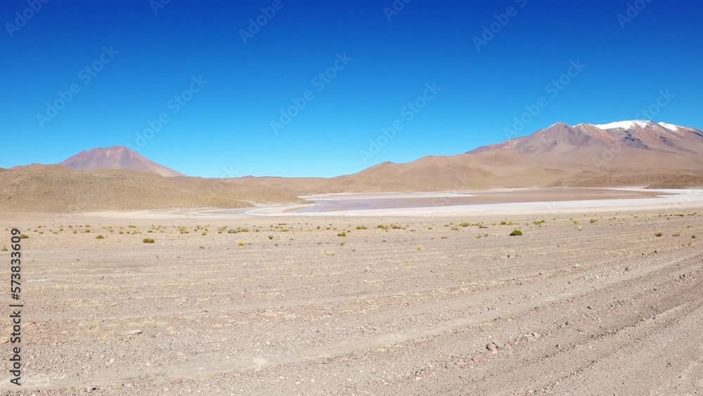 Sand Desert of Lagunas Route, Altiplano Andean Volcanic Landscape, Blue Horizon and Snowy Peak of Cordillera, Bolivian and Chilean Border, Travel and Tourism Sand Desert of Lagunas Route, Altiplano Andean Volcanic Landscape, Blue Horizon and Snowy Peak of Cordillera, Bolivian and Chilean Border, Travel and Tourism