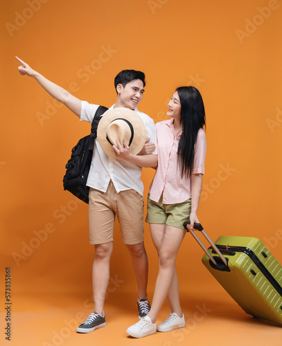 young Asian couple travel concept background