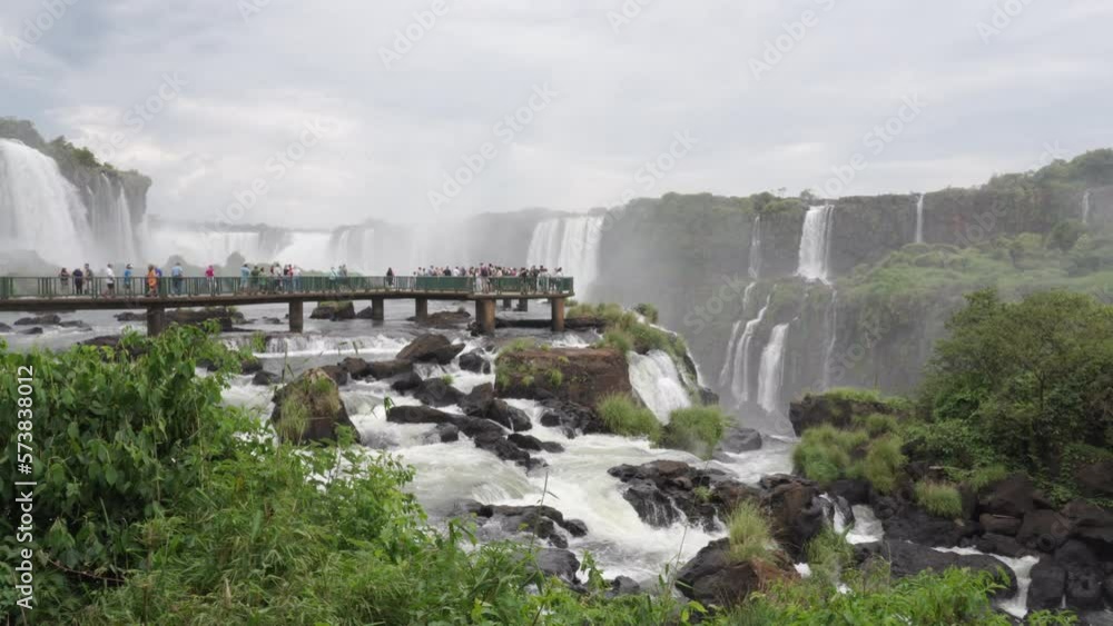 Tourists at Iguazu Falls on the border of Brazil and Argentina 