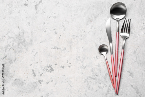 Set of cutlery on grey grunge background