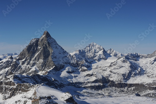Matterhorn mountain peak  in Alps in winter with snow and clear blue sky in Cervinia  Italy and Zermatt  Switzerland. Beautiful and magnificent landscape on a sunny day