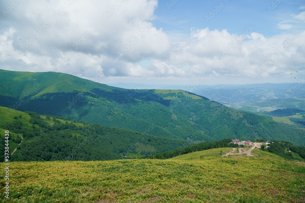 Beautiful summer mountain landscape, forest, clouds. Mount Gemba Pylypets Ukraine. Ukrainian mountains Carpathians, Transcarpathia