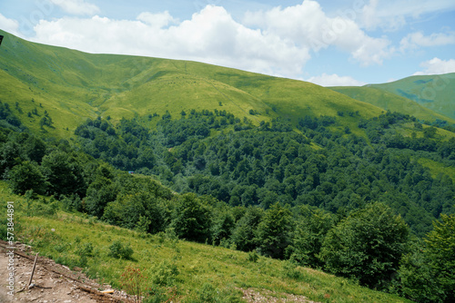 Beautiful summer mountain landscape, forest, clouds. Mount Gemba Pylypets Ukraine. Ukrainian mountains Carpathians, Transcarpathia