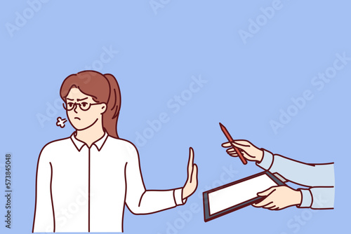 Angry woman making stop gesture suspending business deal and refusing to sign contract. Girl does not want to sign contract from employer who makes job offer with small salary or lack of insurance 