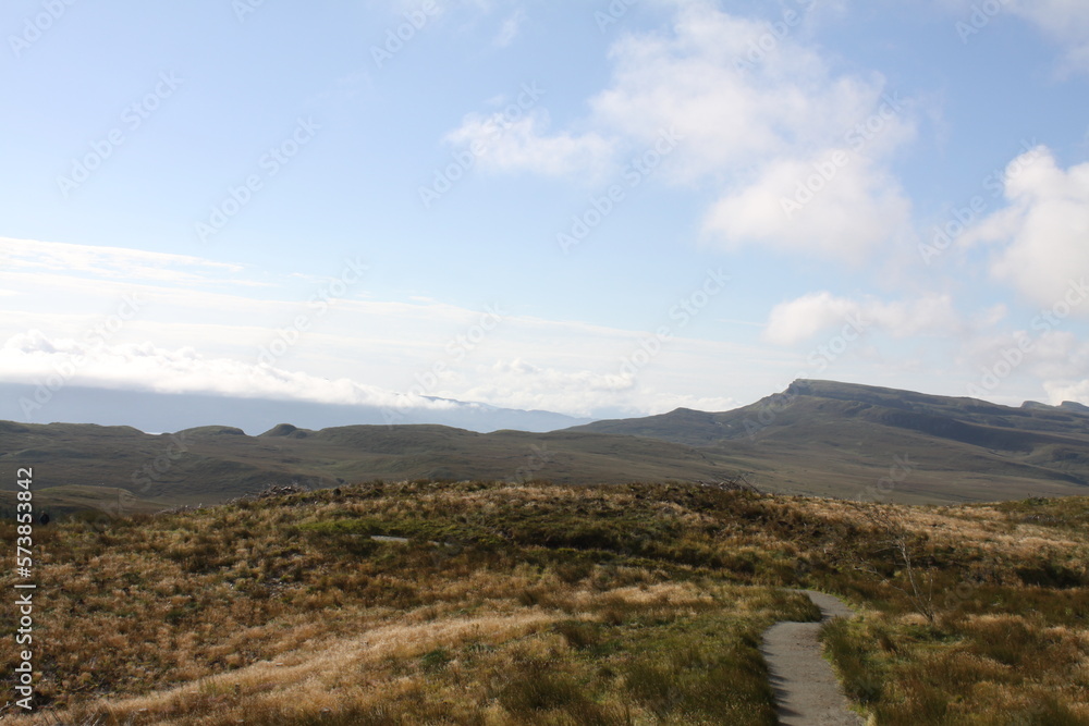 The Old Man of Storr is a famous rock pinnacle on the Isle of Skye, Scotland. A popular hiking spot, it towers at 50 meters high and offers breathtaking panoramic views.